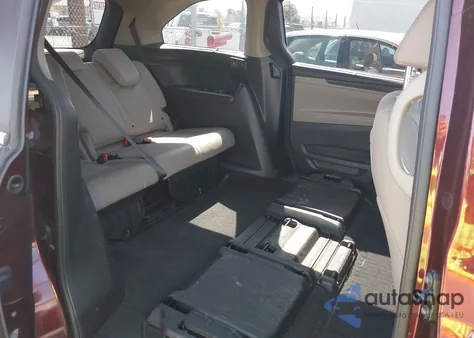 2018 Honda Odyssey Touring z USA, uszkodzony, nr VIN 5FNRL6H8XJB037572